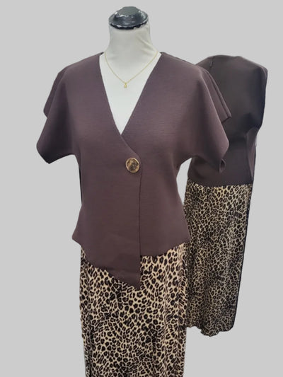 Textured woven asymmetric top